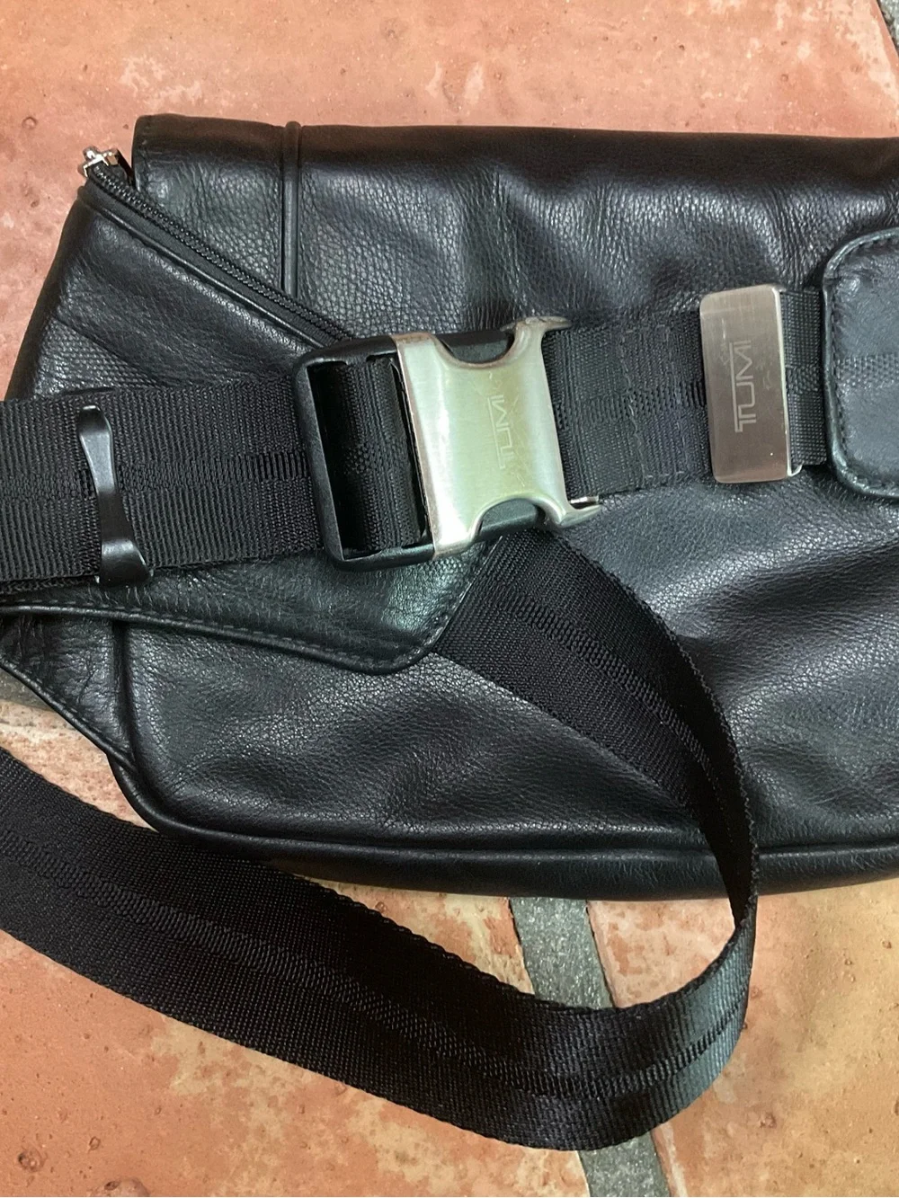 Black Leather Crossbody Sling Bag by Tumi unisex
